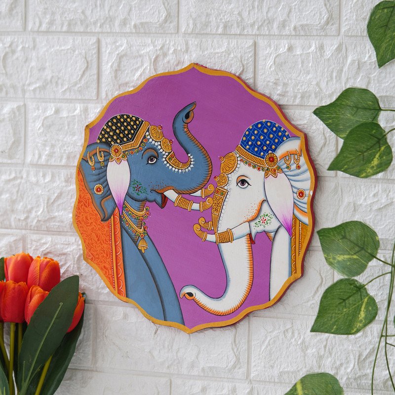 A beautiful pichwai painting of two elephants standing next to each other on a purple plate.
