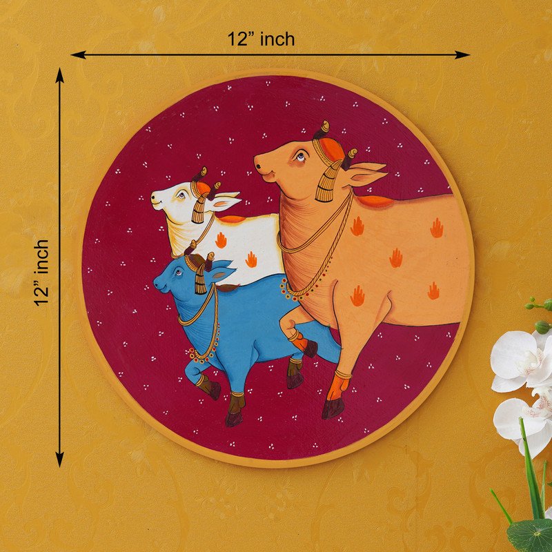 Crafted on a wooden plate, this pichwai portrays three cows in a circular formation.