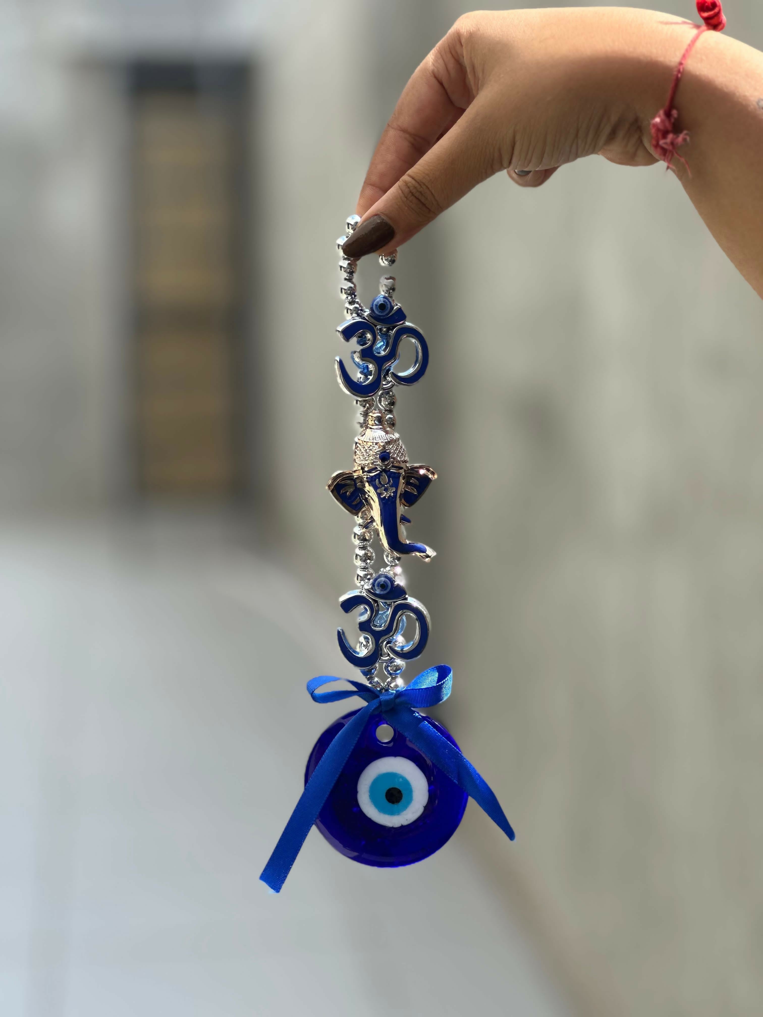 Spiritual Evil Eye Wall Hanging with Om Symbol and Lord Ganesha Design – Blue Nazar Protection Talisman for Home, Office, or Car Decor – Traditional Hindu Good Luck Charm with Bow and Beaded Loop for Positive Vibes and Protection Against Negativity