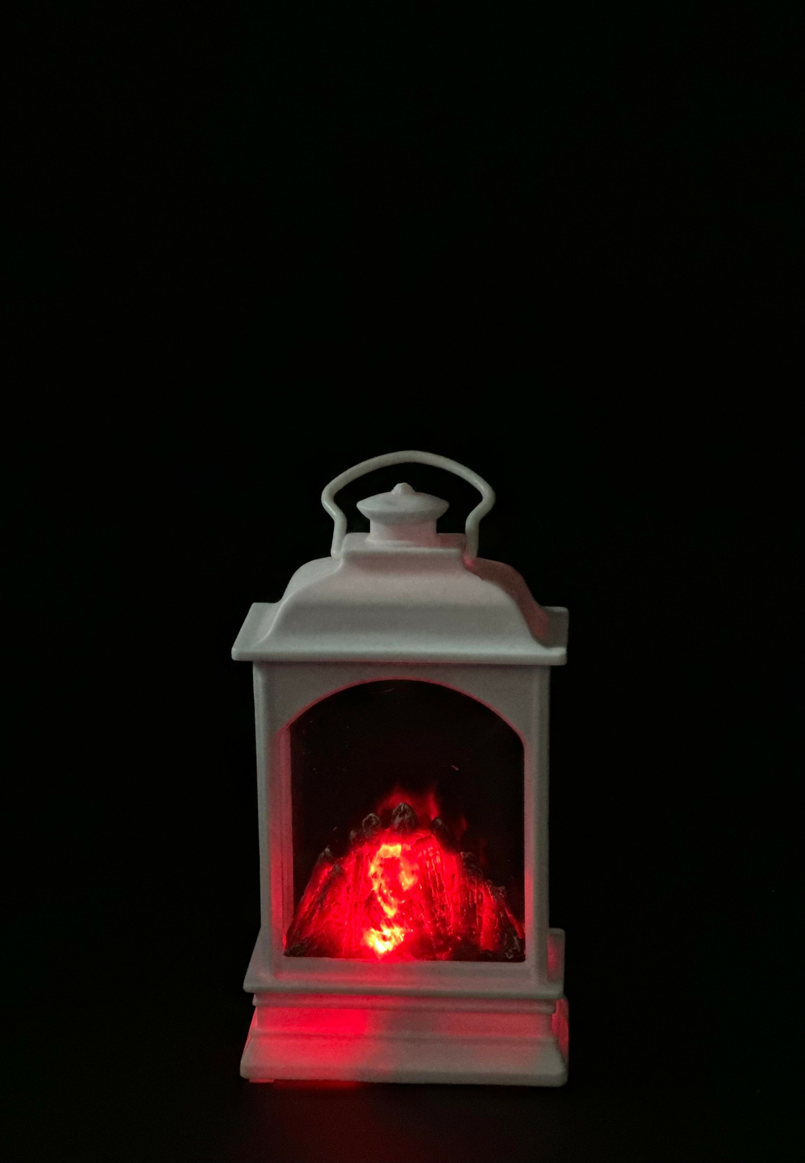 Mini Decorative LED Fireplace Lantern with Glowing Ember Effect – White Vintage Style Portable Tabletop Lamp for Home Décor, Festive Ambience, and Cozy Room Accents – Battery Operated Flameless Fire Simulation Light