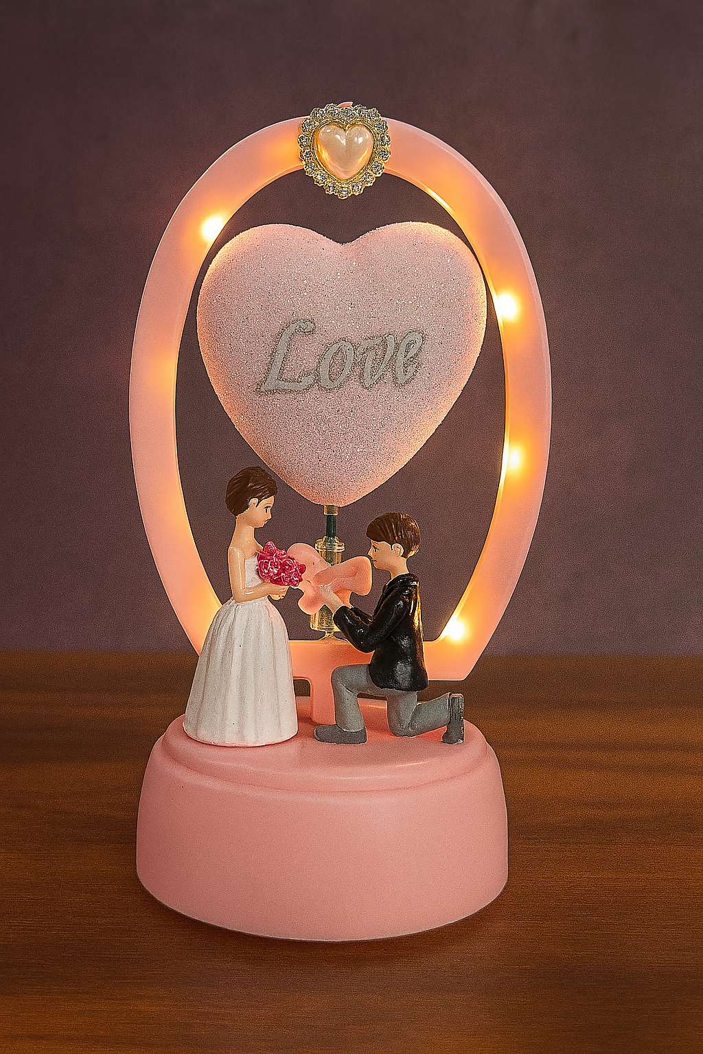 Romantic Couple Figurine Showpiece with LED Heart Balloon – Proposal Scene Love Lamp for Valentine’s Day, Wedding, Anniversary, Birthday & Home Table Decoration (Battery Operated – Pink Base)