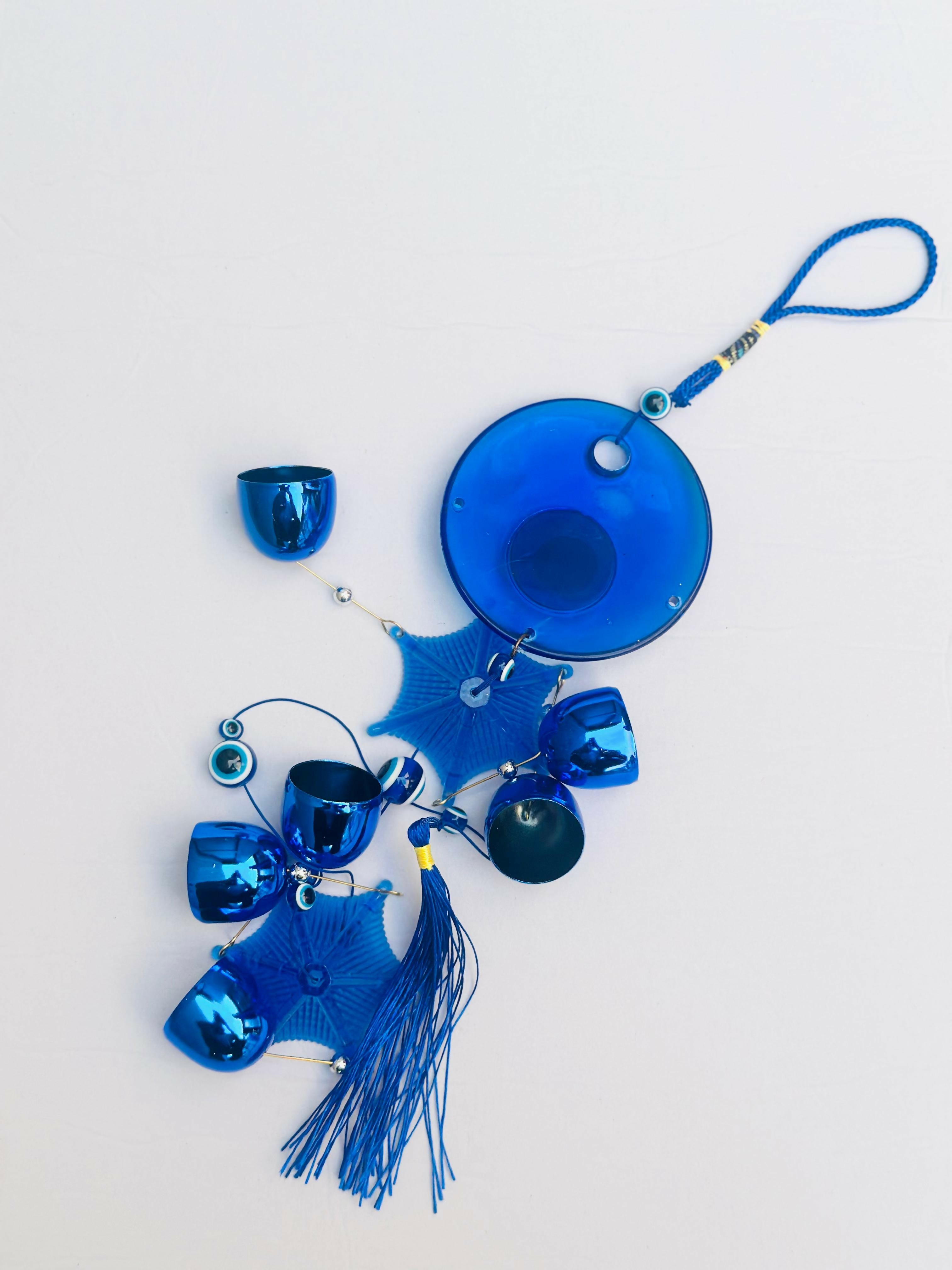 Blue Evil Eye Wind Chime – Decorative Hanging Ornament with Blue Bells, Tassel, Beads & Nazar Amulet for Protection and Home Decor