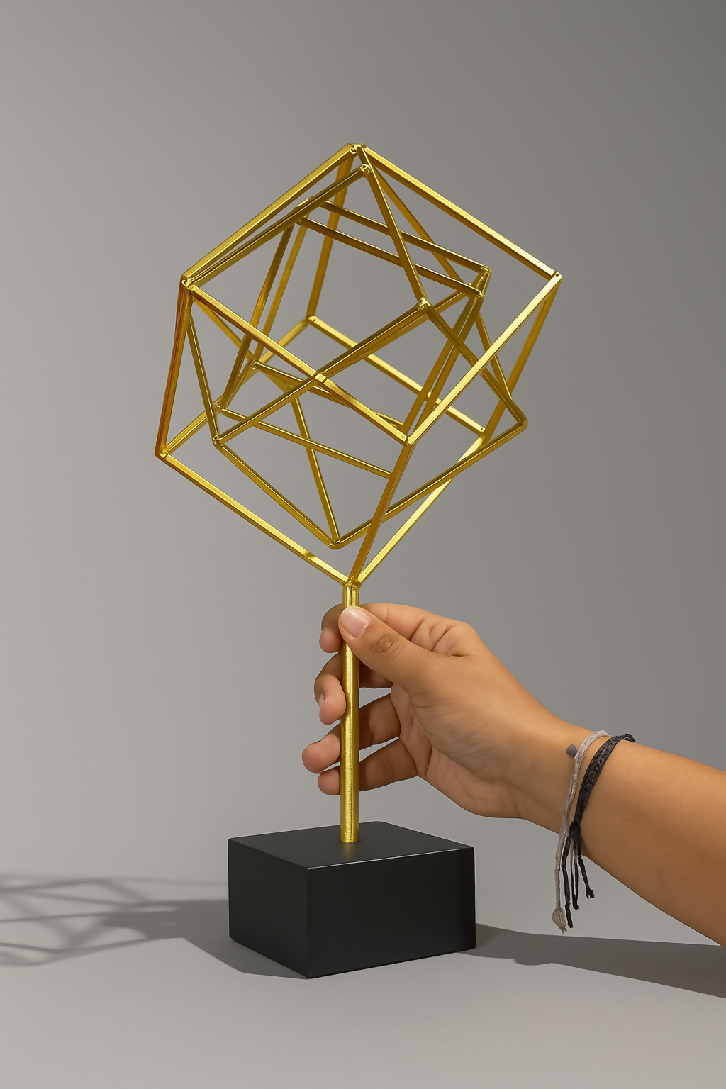 HOME DECOR Golden Geometric Metal Sculpture Showpiece