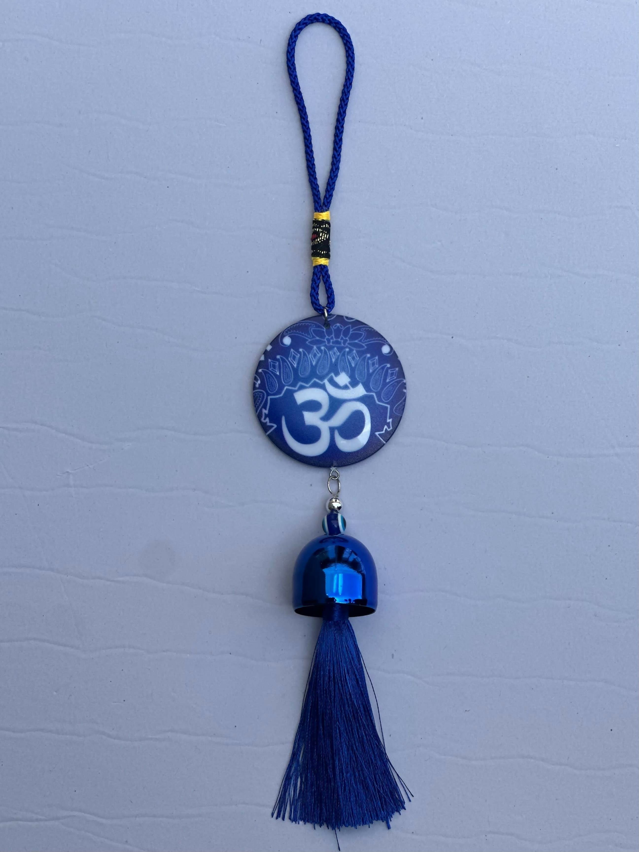 Decorative Blue Om Symbol Wall Hanging with Metal Bell and Tassel – Spiritual Hindu Door Hanging for Positive Vibes, Vastu, Meditation, and Home Entrance Décor – Compact Size for Car, Office, or Gift Use