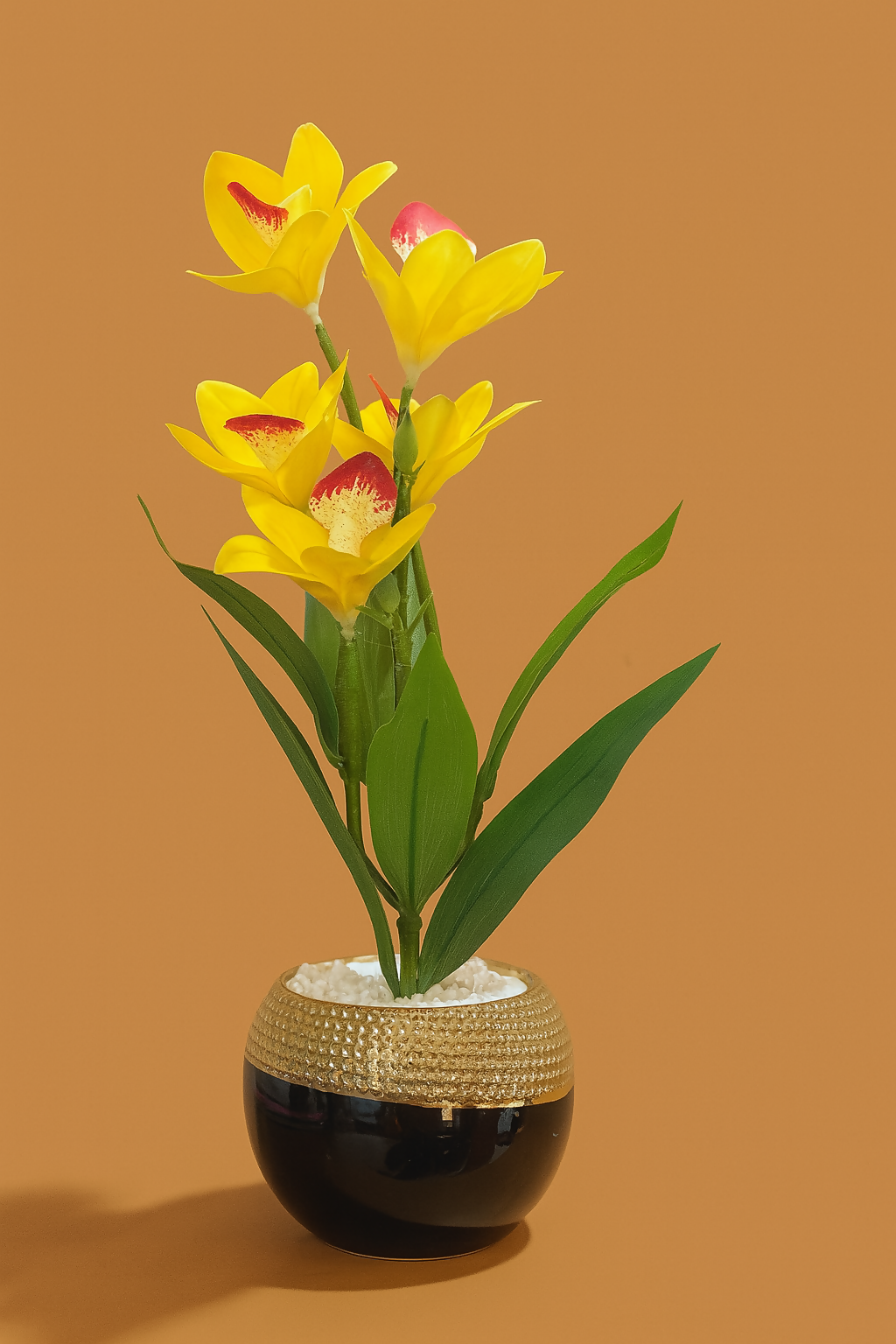 Premium Artificial Yellow Orchid Lily Flower Plant in Glossy Round Pot with Golden Textured Rim – Faux Floral Arrangement with Pebbles for Home, Office & Gifting