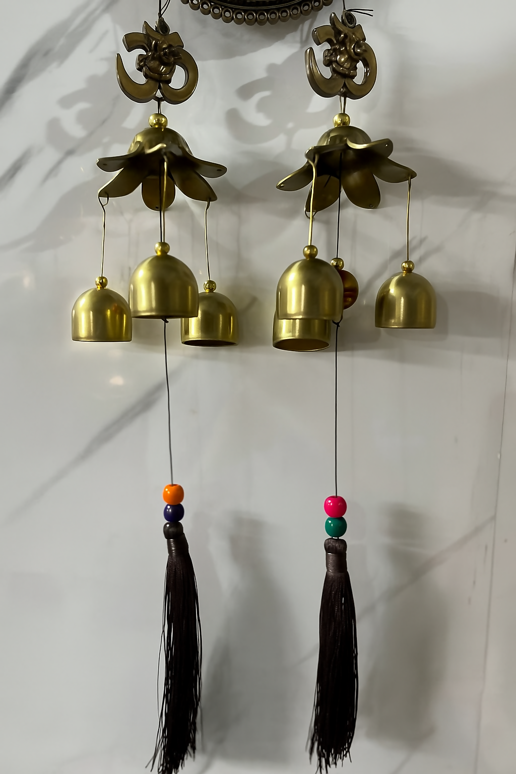 Traditional Om Symbol Brass Wind Chime with 7 Golden Bells and Lotus Dome – Ethnic Wall Hanging for Home Temple, Vastu & Spiritual Decor – Soothing Sound Ornament with Tassels for Indoor/Outdoor Blessings