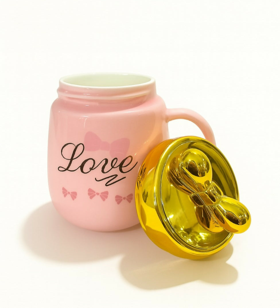 Cute Pink Ceramic Mug with Golden Lid and Bow – “Love” Printed Coffee Mug for Girls – Luxury Gift Tea Cup with Handle and Decorative Ribbon Print – Ideal for Birthday, Valentine & Special Gifting