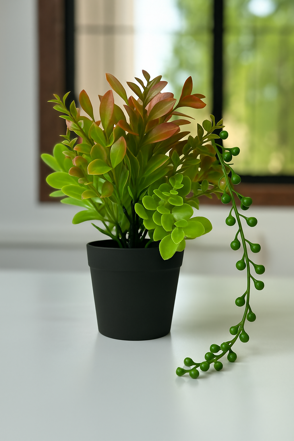 "Artificial Green Leaf Plant in Matte Black Pot – Realistic Faux Indoor Plant for Tabletop, Office Desk & Home Décor – Low Maintenance Decorative Accent – Thoughtful Gift for Housewarming, Diwali, or Festive Occasions"