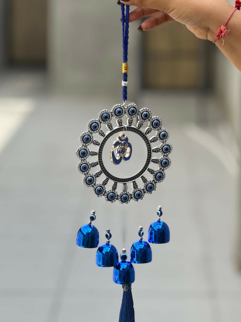 Evil Eye Wall Hanging with Om and Lord Ganesha Symbol – Decorative Blue Nazar Protection Talisman with Bells and Tassels – Vastu and Feng Shui Positive Energy Charm for Home, Office, Temple, or Car Décor
