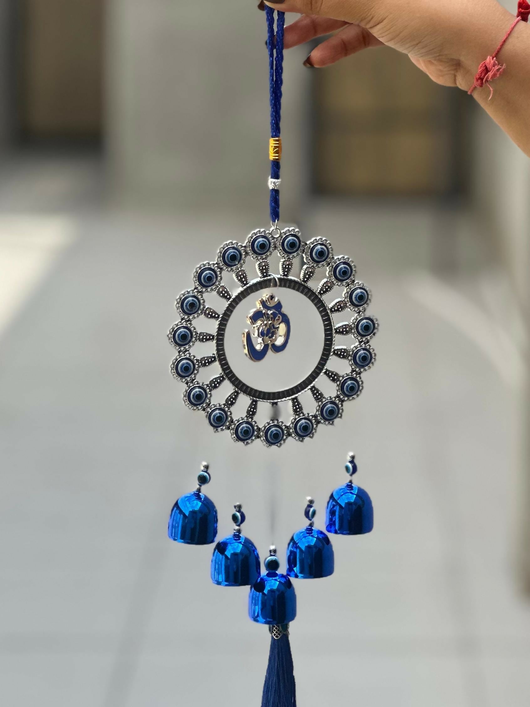 Evil Eye Wall Hanging with Om and Lord Ganesha Symbol – Decorative Blue Nazar Protection Talisman with Bells and Tassels – Vastu and Feng Shui Positive Energy Charm for Home, Office, Temple, or Car Décor