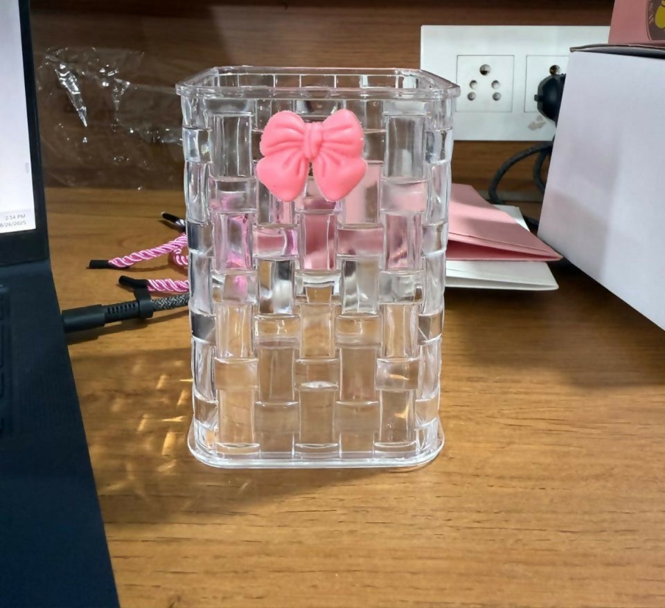 Transparent Grid Pattern Plastic Pen Holder with Cute Bow Design – Multipurpose Desk Organizer for Pencils, Pens, Markers & Stationery – Stylish Tabletop Storage for Home, Office, Kids Study Table & Classroom