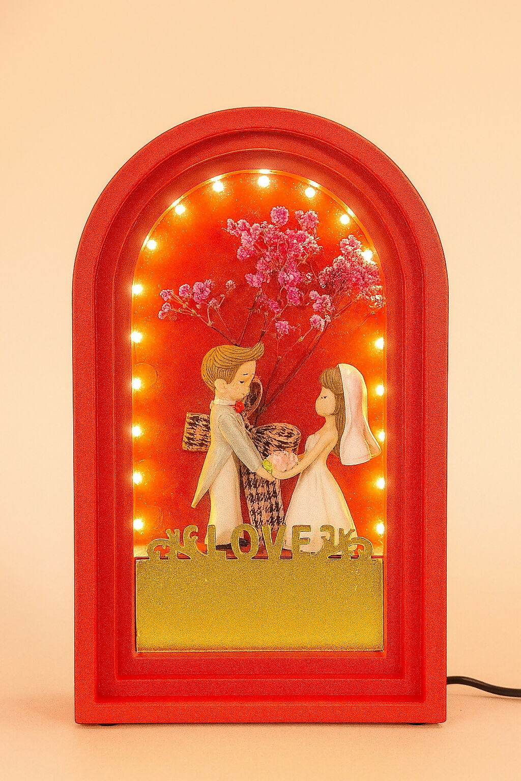 Romantic Wedding Couple Showpiece in Red Arch Frame – LOVE-Themed Decorative Gift for Anniversary, Valentine, Engagement & Home Decor – Bride and Groom Figurine with Floral Background