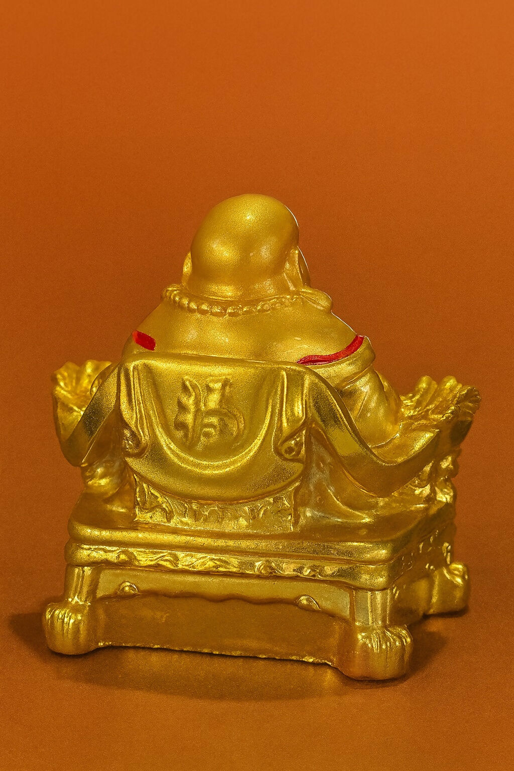 Golden Laughing Buddha Idol Sitting on Wealth Symbols – Resin Feng Shui Statue for Home & Office Decor – Good Luck, Prosperity & Happiness Showpiece