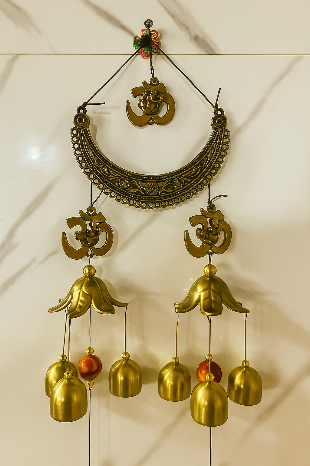 Traditional Om Symbol Brass Wind Chime with 7 Golden Bells and Lotus Dome – Ethnic Wall Hanging for Home Temple, Vastu & Spiritual Decor – Soothing Sound Ornament with Tassels for Indoor/Outdoor Blessings