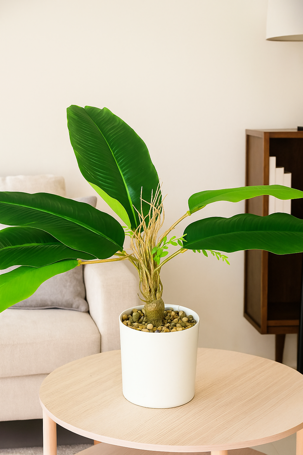 Artificial Banana Leaf Plant in White Ceramic Pot with Decorative Pebbles – Realistic Faux Greenery for Home, Office, or Living Room Decor – Low Maintenance Indoor Decorative Plant for Tabletop or Corner Display