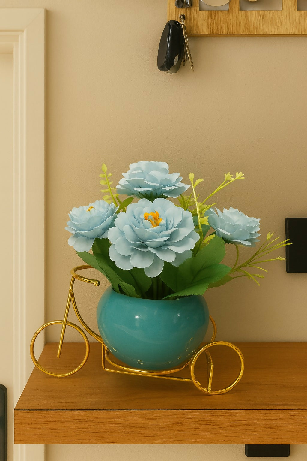 Artificial Blue Rose Flower Arrangement in Glossy Teal Ceramic Pot with Golden Bicycle Stand – Elegant Decorative Table Centerpiece for Home, Office, and Gifting