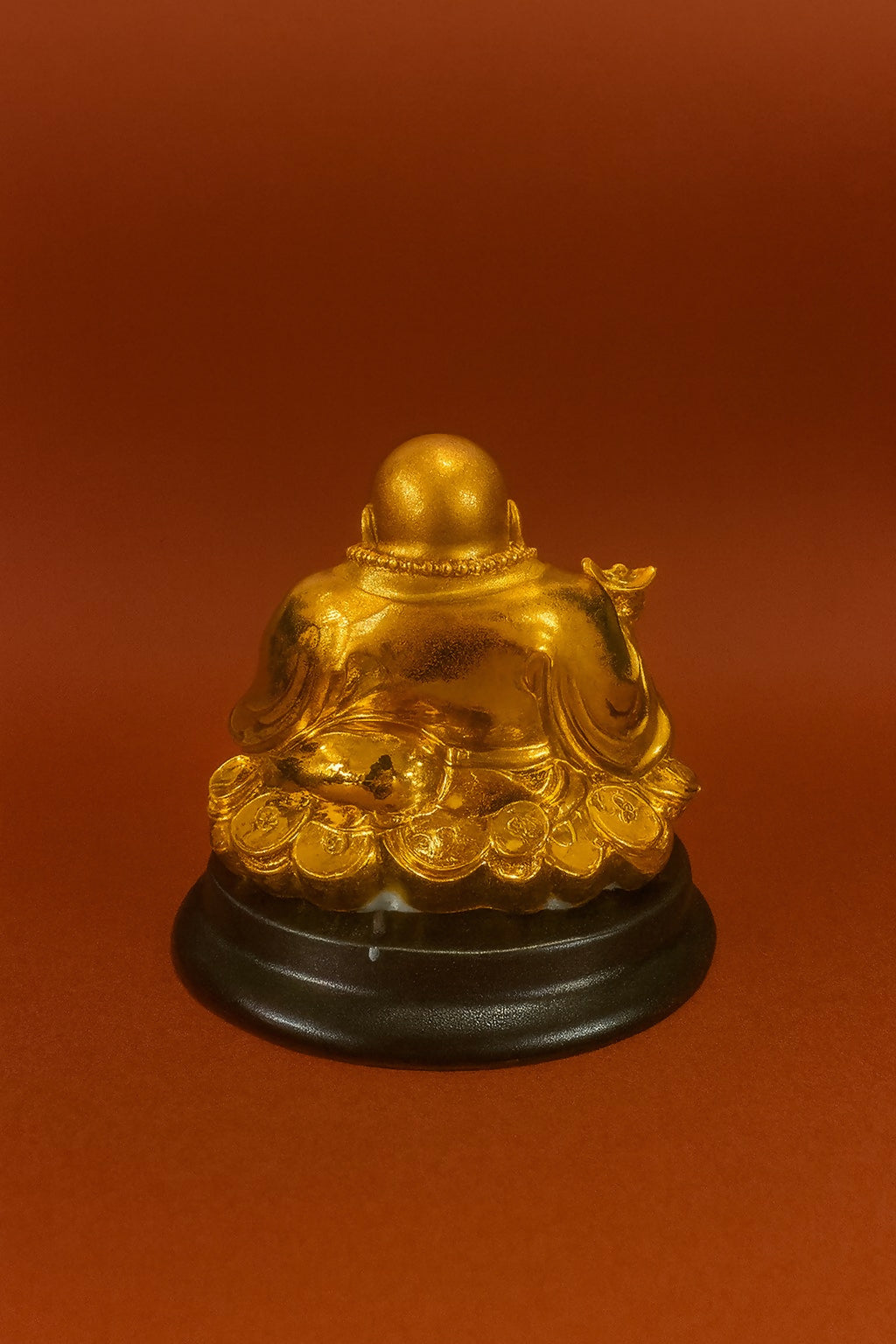 Golden Laughing Buddha Idol Sitting on Wealth Coins with Ingot – Feng Shui Resin Statue on Black Base for Home, Office, Shop & Spiritual Decor – Symbol of Prosperity & Joy