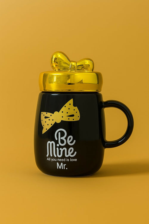 "Be Mine Mr. Black Ceramic Coffee Mug with Golden Lid and Bow Tie – Romantic Gift for Him, Stylish Tea Cup with Quote – All You Need Is Love
