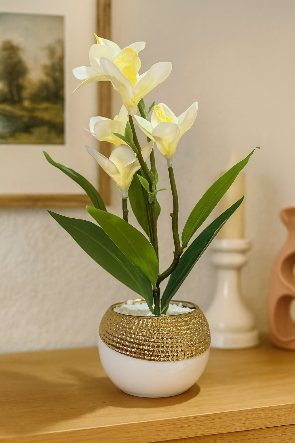 Elegant Artificial Cream Yellow Orchid Lily Flower Plant in Round White Pot with Golden Rim – Faux Floral Arrangement with Pebbles for Home, Office, Tabletop & Gifting