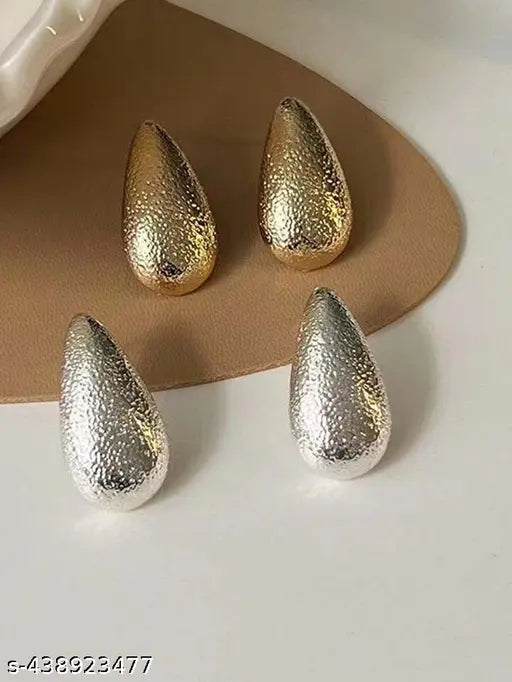 Rose Gold coloured teardrop studs.t