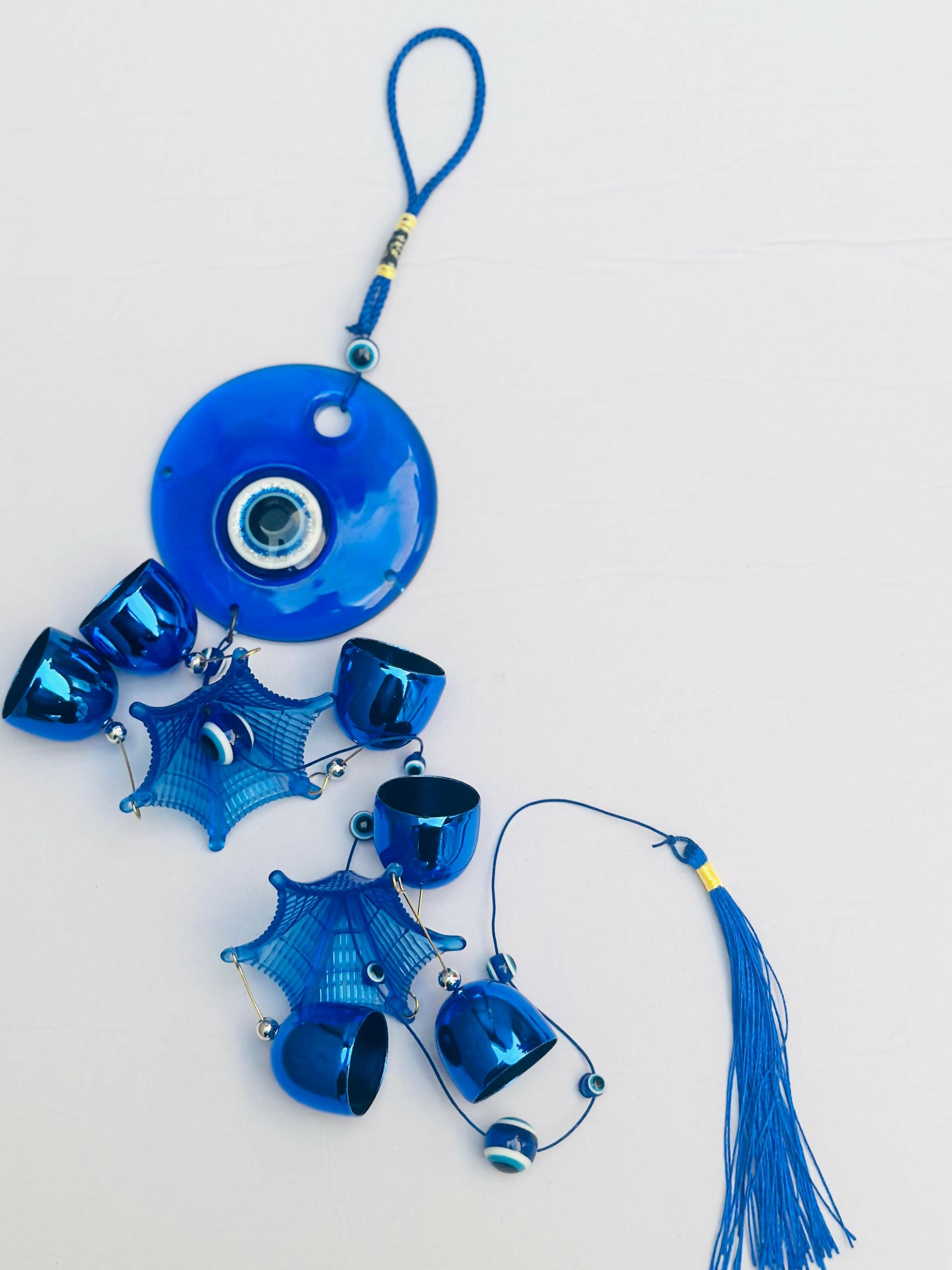 Blue Evil Eye Wind Chime – Decorative Hanging Ornament with Blue Bells, Tassel, Beads & Nazar Amulet for Protection and Home Decor