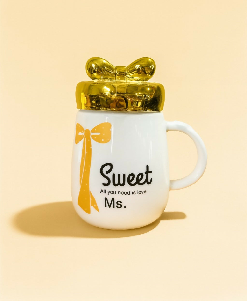 Sweet Ms. Ceramic Mug with Golden Bow Lid – White Coffee & Tea Cup with Yellow Ribbon Print – Cute Gift Mug for Girls, Women, Friends – “All You Need is Love” Printed Cup