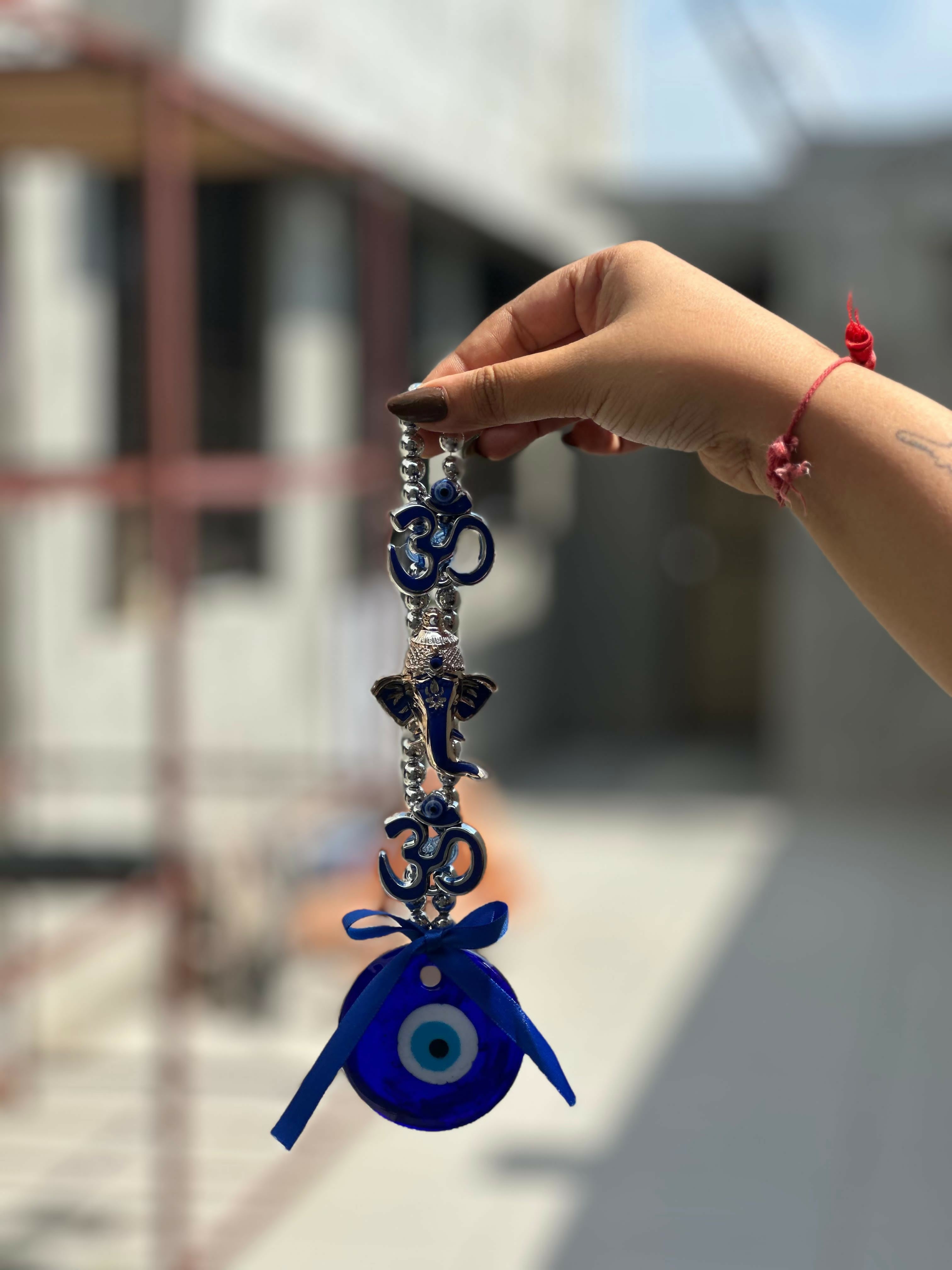 Spiritual Evil Eye Wall Hanging with Om Symbol and Lord Ganesha Design – Blue Nazar Protection Talisman for Home, Office, or Car Decor – Traditional Hindu Good Luck Charm with Bow and Beaded Loop for Positive Vibes and Protection Against Negativity