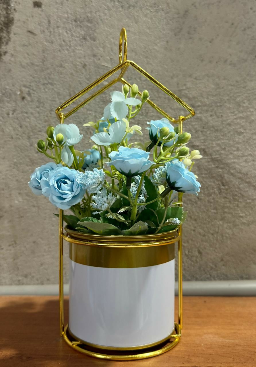 Golden Metal House-Shaped Stand with Artificial Blue Roses and Fillers in Glossy White Pot – Elegant Decorative Flower Arrangement for Home, Office & Gift