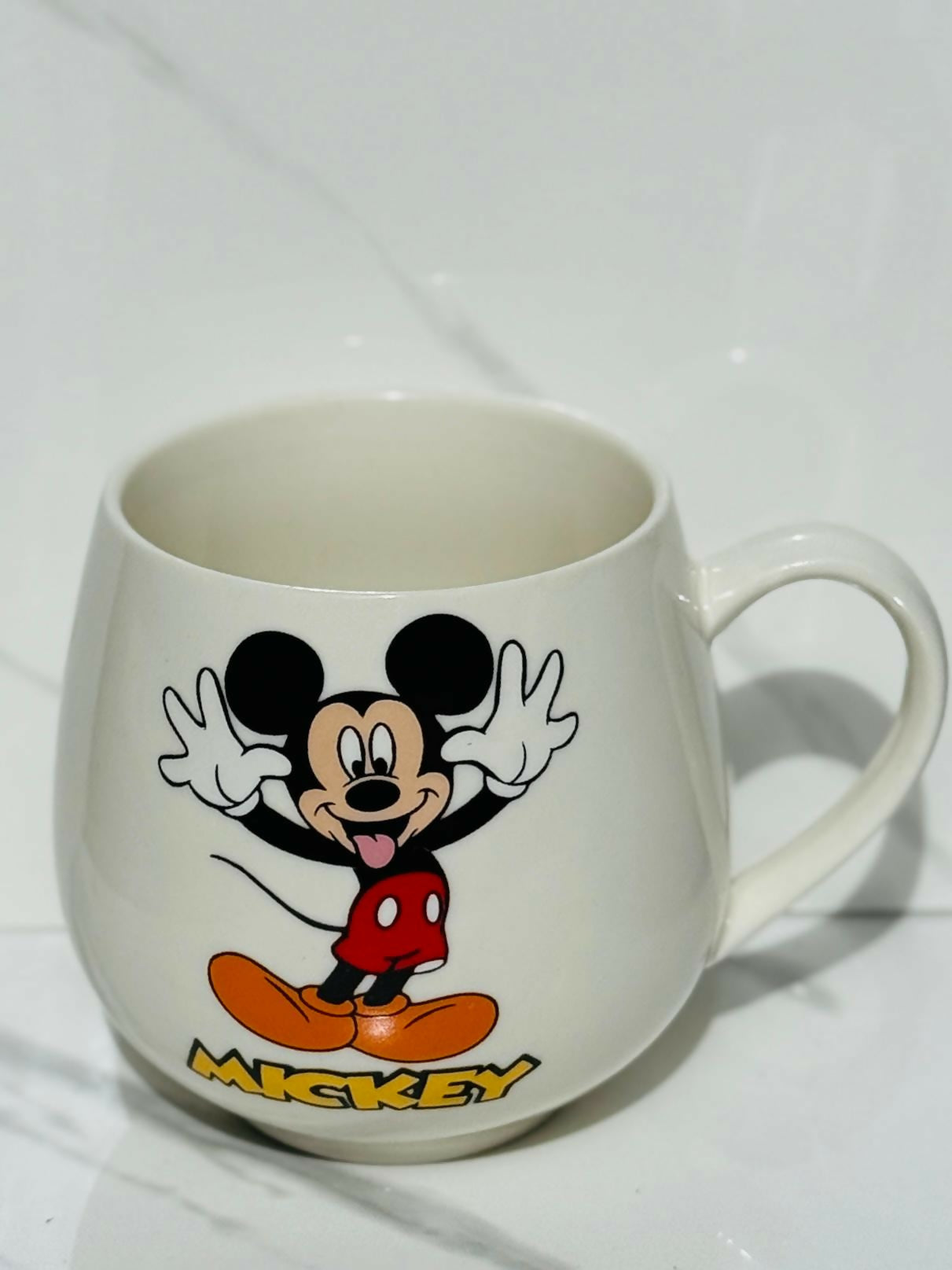 Classic Cartoon Character Ceramic Coffee Mug – Rounded Cup with Iconic Red Shorts and Yellow Shoes Design, Fun Drinkware for Kids & Adults