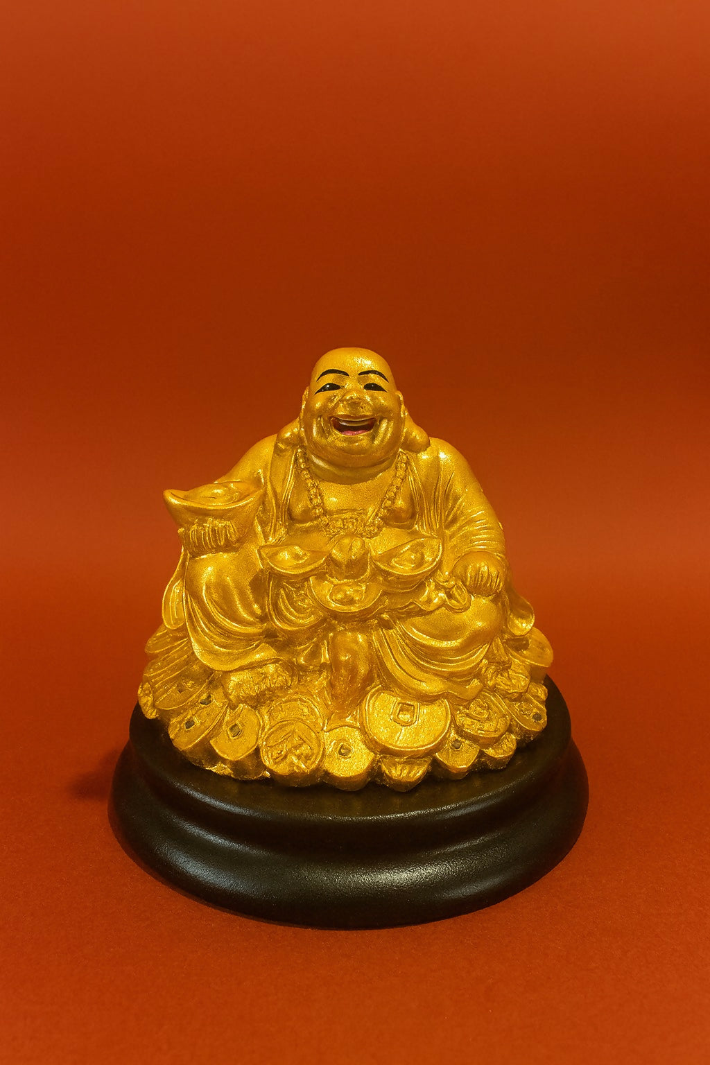 Golden Laughing Buddha Idol Sitting on Wealth Coins with Ingot – Feng Shui Resin Statue on Black Base for Home, Office, Shop & Spiritual Decor – Symbol of Prosperity & Joy