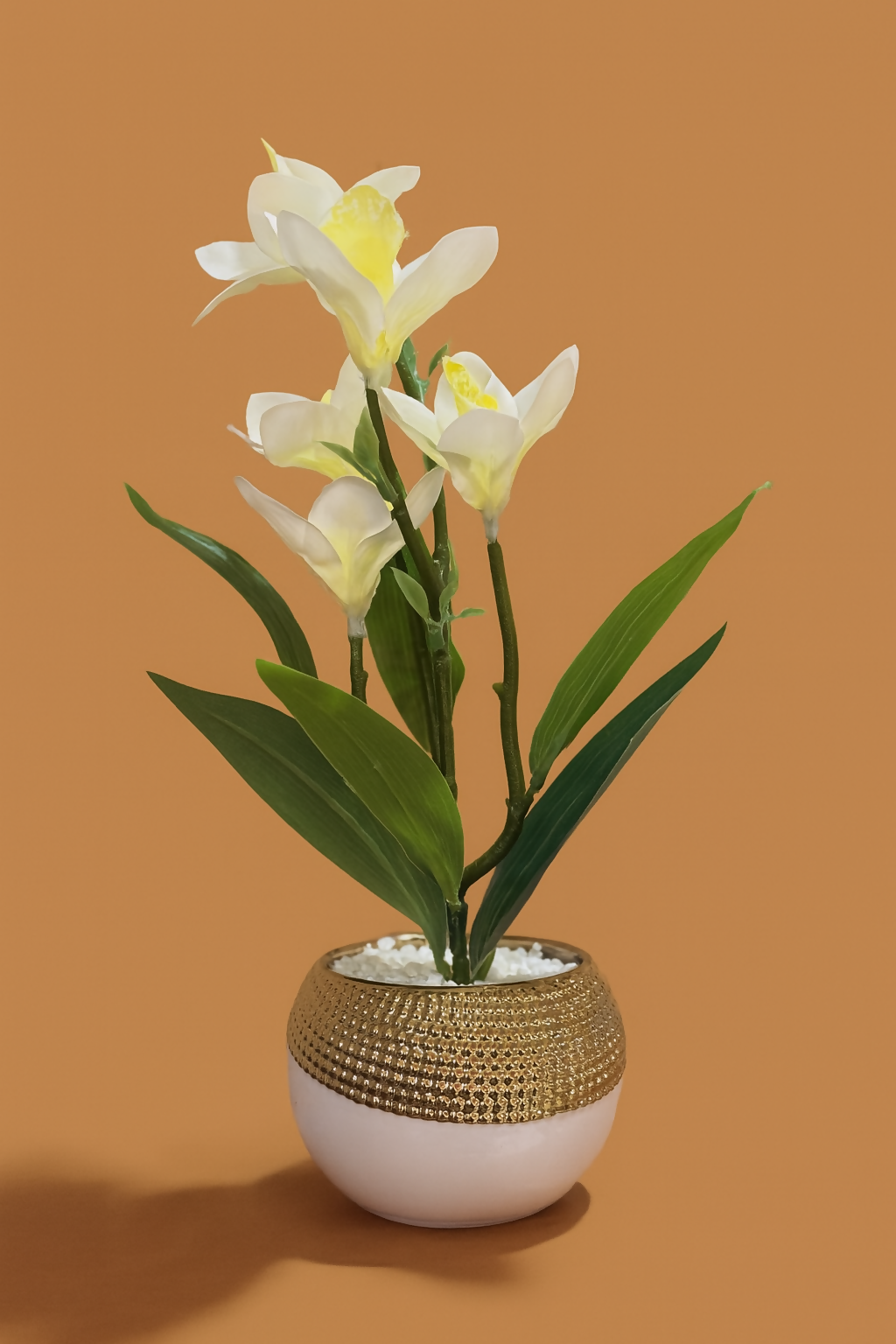 Elegant Artificial Cream Yellow Orchid Lily Flower Plant in Round White Pot with Golden Rim – Faux Floral Arrangement with Pebbles for Home, Office, Tabletop & Gifting