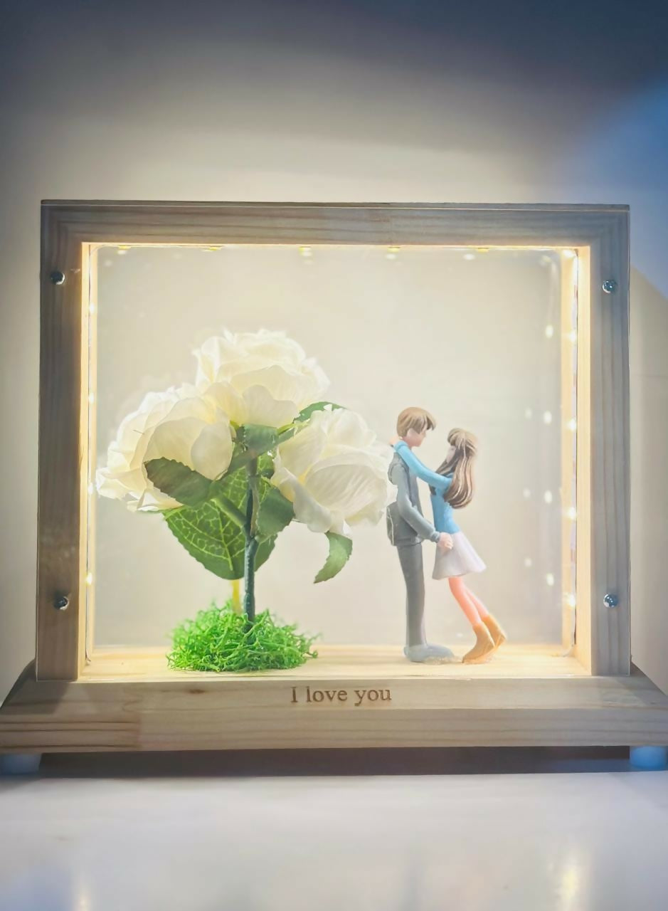 "LED Light-Up Wooden Box Frame with Artificial Pink Roses and Romantic Couple Figurines – I Love You Decorative Gift for Anniversary, Valentine's Day, or Bedroom Table Display
