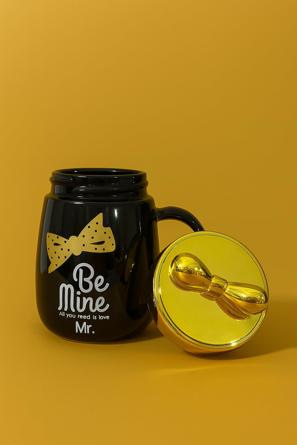 "Be Mine Mr. Black Ceramic Coffee Mug with Golden Lid and Bow Tie – Romantic Gift for Him, Stylish Tea Cup with Quote – All You Need Is Love